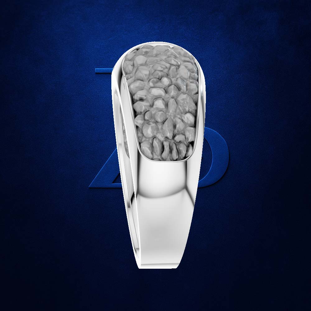 A silver-toned men's ring featuring a textured, pebble-like gray inlay on the top half of a smooth teardrop-shaped band, set against a dark textured blue background.
