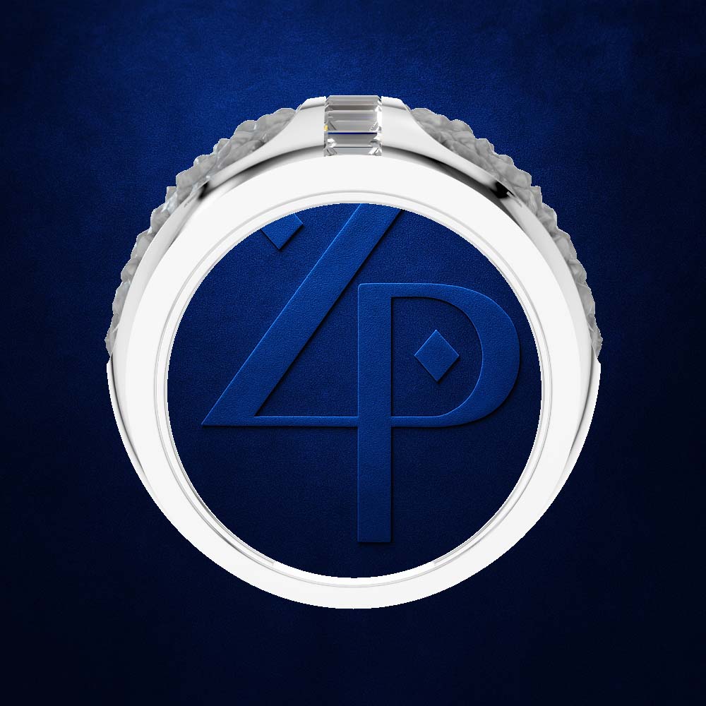 A silver-toned circular ring or medallion with a deep blue insert featuring an embossed stylized 'ZP' logo, shown against a textured dark blue background.