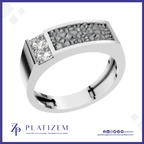 A silver-toned ring with a rectangular pavé diamond setting and a square-cut clear gemstone, shown on a white background with the Platiszem brand logo at the bottom.