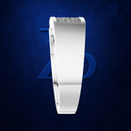 A white curved ring with a row of small clear stones across the top, shown against a dark blue textured background with a faint blue Marvel logo behind it.