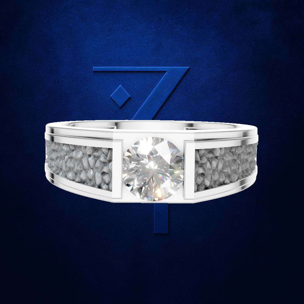 A silver-toned ring with a large round clear center stone and textured pavé side stones, shown against a dark blue textured background with a blue stylized '7' logo behind it.
