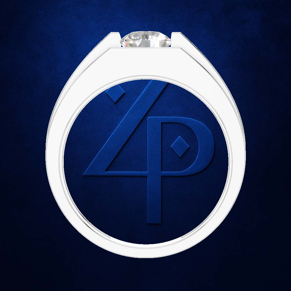 A white ring-shaped pendant or medallion with a clear faceted gemstone at the top and a large embossed blue monogram inside, shown on a dark blue textured background.