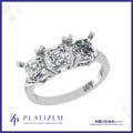 Three Equal Emerald Cut Diamonds Set Together on a Tapered Band