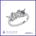 Trio of Emerald Cut Diamonds Arranged in a Matching Three Stone Ring