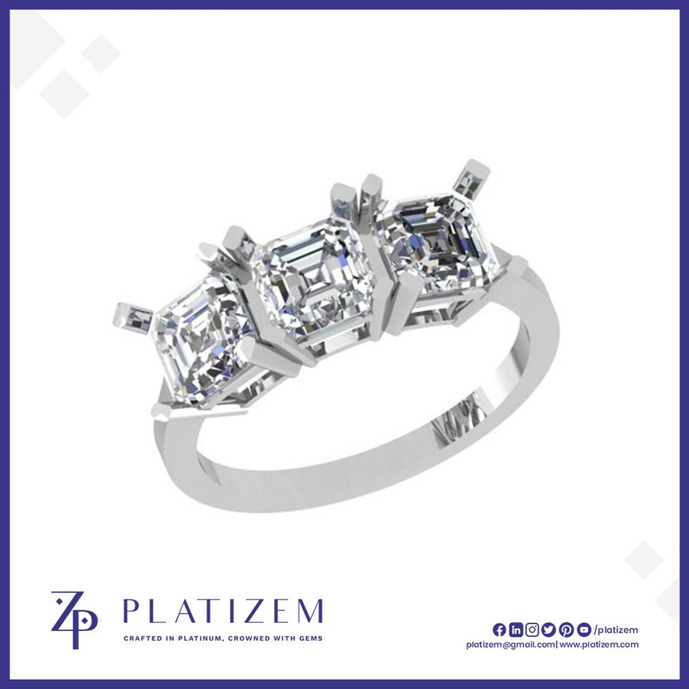 Trio of Emerald Cut Diamonds Arranged in a Matching Three Stone Ring