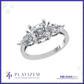Emerald and Pear Three Stone Diamond Ring
