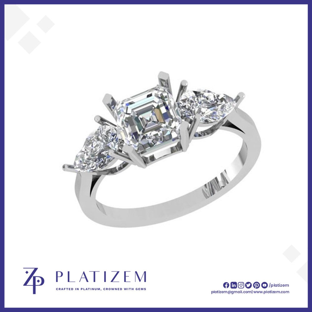 18kt Emerald and Pear Three Stone Diamond Ring