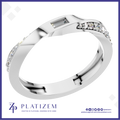 Baguette Diamond Ring Flanked by Graduated Round Diamonds on a Twist Band