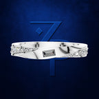 Baguette Diamond Ring Flanked by Graduated Round Diamonds on a Twist Band