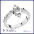 Marquise Diamond Ring on a Split Prong Band Lined with Round Diamonds