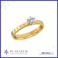 Round Diamond Ring with Bezel Set Round Diamonds Along a Milgrain Band