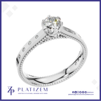 Round Diamond Ring with Bezel Set Round Diamonds Along a Milgrain Band