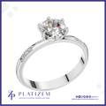 Round Diamond Solitaire Ring on a Band Set with Round Diamond Accents
