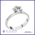 Round Diamond Solitaire Ring on a Band Set with Round Diamond Accents