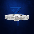 Round Diamond Ring on a Milgrain Trimmed Band Lined with Round Diamonds