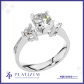 Round Diamond Three Stone Ring with a Graduated Pave Set Diamond Band
