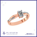 Emerald Cut Diamond Ring with Baguette Accents on a Gently Twisted Band