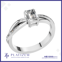 Emerald Cut Diamond Ring with Baguette Accents on a Gently Twisted Band