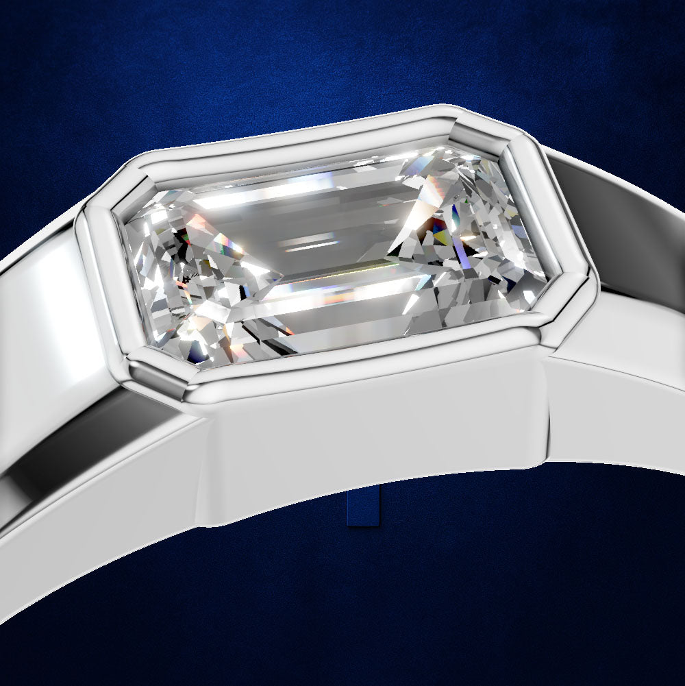 Emerald Cut Diamond Ring in a Bezel Setting on a Sleek Two Tone Band