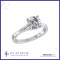 Round Diamond Solitaire Ring on a Tapered Cathedral Style Band