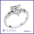 Heart Cut Diamond Ring with Marquise Diamonds on a Curved Twist Band