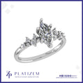 Marquise Diamond Ring with a Graduated Cluster of Round Diamonds