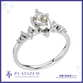 Marquise Diamond Ring with a Graduated Cluster of Round Diamonds