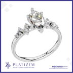 Marquise Diamond Ring with a Graduated Cluster of Round Diamonds