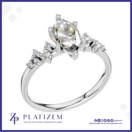 Marquise Diamond Ring with a Graduated Cluster of Round Diamonds