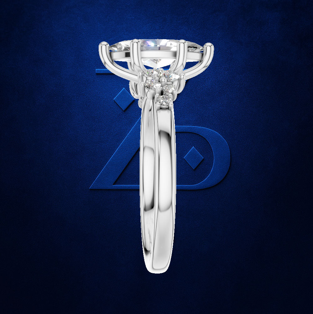 Marquise Diamond Ring with a Graduated Cluster of Round Diamonds