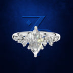 Marquise Diamond Ring with a Graduated Cluster of Round Diamonds