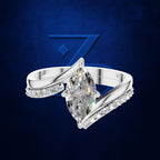Marquise Diamond Ring on a Bypass Band Lined with Round Diamonds