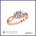 Oval Diamond Ring Wrapped in Vines and Leaves with Round Diamond Trim