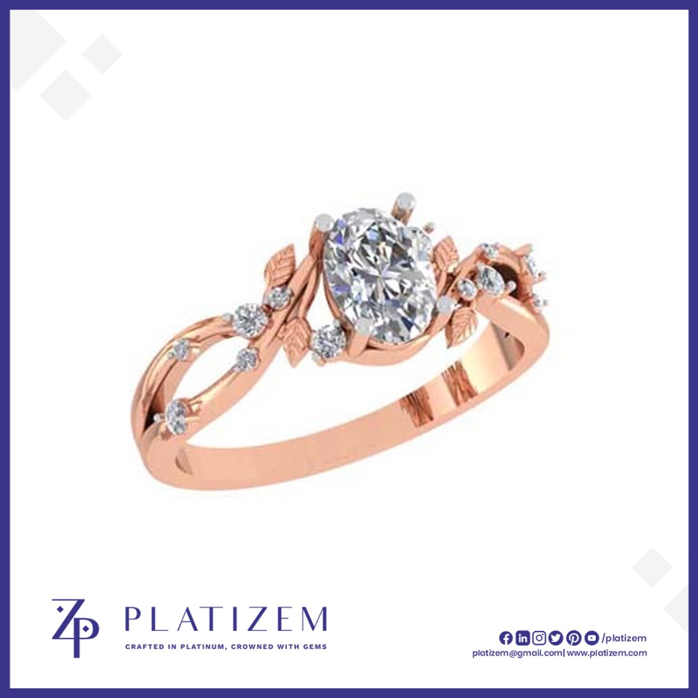 Oval Diamond Ring Wrapped in Vines and Leaves with Round Diamond Trim