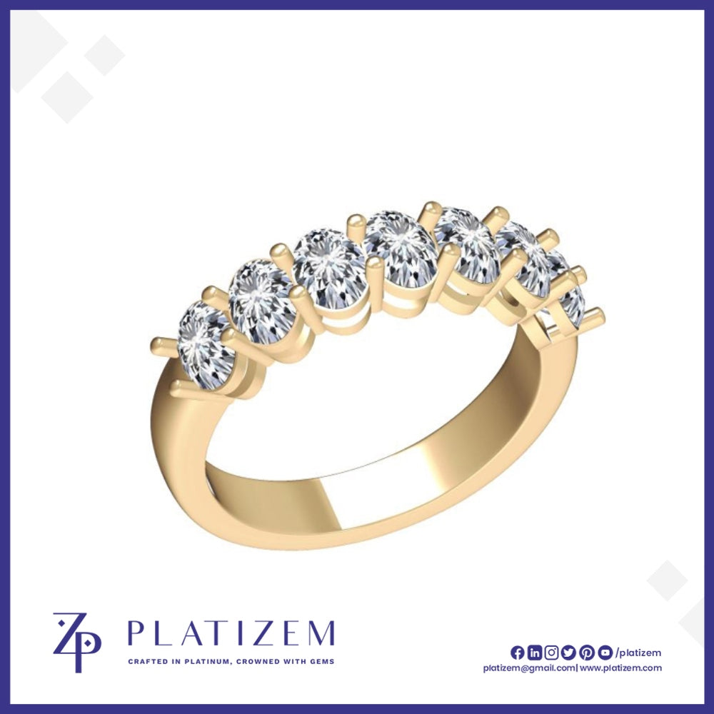 A yellow gold five-stone diamond ring with round-cut clear diamonds set in a classic prong setting, displayed on a white background with the brand logo 'PLATIZEM' at the bottom.